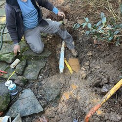 Ecosystems Services - The repair of the broken irrigation mainline pipe due to a gasline installation.