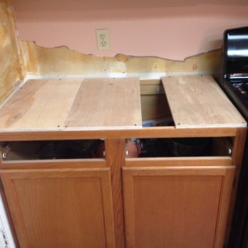 ABC Flooring - They don't even use full decking. And the salesman promised 3/4 inch plywood, which this is not. - Cabinetry Near Me - South Houston, Texas