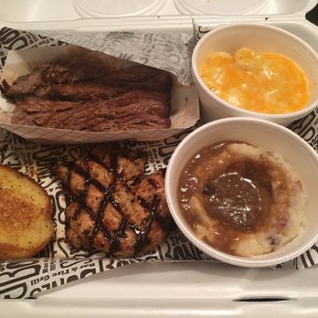 Smokey Bones - Pick two combo of chicken, beef brisket, mashed potatoes, and macaroni and cheese. - Barbeque Near Me - Orlando, Florida Smokey Bones - Pick two combo of chicken, beef brisket, mashed potatoes, and macaroni and cheese. - Barbeque Near Me - Orlando, Florida