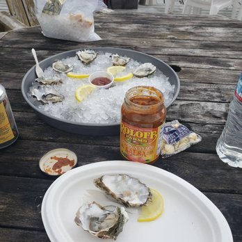 Oysterville Sea Farms - Half shell oysters with a Pumpkin Peach Salsa sold in the market. - Specialty Food Near Me - Oysterville, Washington Oysterville Sea Farms - Half shell oysters with a Pumpkin Peach Salsa sold in the market. - Specialty Food Near Me - Oysterville, Washington