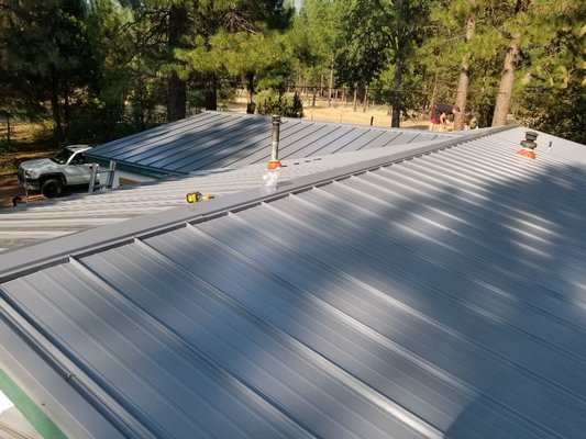 Metal Roofing - Northern Counties Roofing Systems: Your Metal Roofing Specialists
At Northern Counties Roofing Systems, we’re committed to delivering superior metal roofing solutions that stand up to the harshest elements. Our dedication to craftsmanship and customer satisfaction sets us apart, ensuring every project receives the personal attention it deserves. Whether you’re upgrading an existing roof or designing a new structure, count on our expertise to provide a durable, energy-efficient system that protects your home or business for decades.
The Benefits of Metal Roofing
Long-Term Durability
Metal roofs resist cracking, shrinking, and eroding more effectively than many other materials. They withstand wind, snow, and temperature extremes, reducing the risk of costly repairs.
Energy Efficiency
Many metal roofing products reflect solar heat rather than absorbing it, helping stabilize indoor temperatures. In warm seasons, this can lessen reliance on air conditioning and lower utility bills.
Low Maintenance
Aside from periodic inspections, metal roofs generally require minimal upkeep. This simplicity means less time (and money) spent on repairs or replacements.
Eco-Friendly
Most metal roofing is recyclable, and many panels come from recycled materials. This makes metal one of the most sustainable roofing options on the market.
Attractive & Versatile
Available in an array of colors, profiles, and finishes, metal roofs can match traditional, modern, or any aesthetic you desire.
Types of Metal Roofs We Install
Standing Seam
Known for their distinctive vertical lines, these systems offer sleek designs and excellent leak protection.
Metal Shingles & Tiles
Ideal for those seeking the look of slate, tile, or wood shake with the durability of metal.
Corrugated Panels
Lightweight yet strong, these panels are popular in both rural and contemporary urban settings.
Our 5-Step Process
Consultation & Inspection
We assess your property and discuss goals, budget, and design preferences to recommend the ideal metal roofing solution.
Clear Proposal
We provide a detailed outline of materials, costs, and timelines, ensuring you’re fully informed before moving forward.
Expert Installation
Our skilled team follows strict industry standards, focusing on precise panel placement, secure fasteners, and proper ventilation.
Quality Assurance
Upon completion, we conduct a thorough inspection to confirm that each seam, flashing, and ridge meets our exacting quality benchmarks.
Ongoing Support
We’re here to answer questions and provide maintenance tips, ensuring your metal roof remains in peak condition.
Why Northern Counties Roofing Systems?
Skilled Craftsmanship: Our installers stay current with the latest roofing innovations, delivering work that’s built to last.
Client-Centric Approach: We prioritize open communication and honest guidance, making sure you’re comfortable at every step.
Superior Materials: We partner with trusted suppliers for corrosion-resistant metals, protective coatings, and warranties you can rely on.
Local Knowledge: Serving the Northern Counties region, we design and install roofs that perform exceptionally well in local climates.
Commitment to Safety: Our projects follow rigorous safety protocols, protecting your property and our crew.
A Company You Can Trust
From small residential upgrades to large-scale commercial installations, Northern Counties Roofing Systems has helped countless customers enhance their properties with metal roofing. We understand the importance of a secure, efficient roof—especially in demanding weather conditions—and strive to exceed expectations on every project.
Customer Testimonials
“We were impressed with the professionalism and thoroughness throughout the installation. Our new metal roof looks fantastic!”
“They recommended a standing seam design that perfectly matched our home’s modern style. Couldn’t be happier with the outcome.”
Start Your Metal Roofing Project Today
Investing in a metal roof is a decision that can offer significant returns in longevity, energy savings, and overall peace of mind. When you choose Northern Counties Roofing Systems, you’re choosing a partner dedicated to high-quality workmanship, transparent communication, and exceptional value.
Contact us now to schedule a consultation or learn more about our metal roofing options. Let us show you why so many property owners in the Northern Counties region trust us to safeguard their homes and businesses with best-in-class roofing solutions. Metal Roofing - Northern Counties Roofing Systems: Your Metal Roofing Specialists
At Northern Counties Roofing Systems, we’re committed to delivering superior metal roofing solutions that stand up to the harshest elements. Our dedication to craftsmanship and customer satisfaction sets us apart, ensuring every project receives the personal attention it deserves. Whether you’re upgrading an existing roof or designing a new structure, count on our expertise to provide a durable, energy-efficient system that protects your home or business for decades.
The Benefits of Metal Roofing
Long-Term Durability
Metal roofs resist cracking, shrinking, and eroding more effectively than many other materials. They withstand wind, snow, and temperature extremes, reducing the risk of costly repairs.
Energy Efficiency
Many metal roofing products reflect solar heat rather than absorbing it, helping stabilize indoor temperatures. In warm seasons, this can lessen reliance on air conditioning and lower utility bills.
Low Maintenance
Aside from periodic inspections, metal roofs generally require minimal upkeep. This simplicity means less time (and money) spent on repairs or replacements.
Eco-Friendly
Most metal roofing is recyclable, and many panels come from recycled materials. This makes metal one of the most sustainable roofing options on the market.
Attractive & Versatile
Available in an array of colors, profiles, and finishes, metal roofs can match traditional, modern, or any aesthetic you desire.
Types of Metal Roofs We Install
Standing Seam
Known for their distinctive vertical lines, these systems offer sleek designs and excellent leak protection.
Metal Shingles & Tiles
Ideal for those seeking the look of slate, tile, or wood shake with the durability of metal.
Corrugated Panels
Lightweight yet strong, these panels are popular in both rural and contemporary urban settings.
Our 5-Step Process
Consultation & Inspection
We assess your property and discuss goals, budget, and design preferences to recommend the ideal metal roofing solution.
Clear Proposal
We provide a detailed outline of materials, costs, and timelines, ensuring you’re fully informed before moving forward.
Expert Installation
Our skilled team follows strict industry standards, focusing on precise panel placement, secure fasteners, and proper ventilation.
Quality Assurance
Upon completion, we conduct a thorough inspection to confirm that each seam, flashing, and ridge meets our exacting quality benchmarks.
Ongoing Support
We’re here to answer questions and provide maintenance tips, ensuring your metal roof remains in peak condition.
Why Northern Counties Roofing Systems?
Skilled Craftsmanship: Our installers stay current with the latest roofing innovations, delivering work that’s built to last.
Client-Centric Approach: We prioritize open communication and honest guidance, making sure you’re comfortable at every step.
Superior Materials: We partner with trusted suppliers for corrosion-resistant metals, protective coatings, and warranties you can rely on.
Local Knowledge: Serving the Northern Counties region, we design and install roofs that perform exceptionally well in local climates.
Commitment to Safety: Our projects follow rigorous safety protocols, protecting your property and our crew.
A Company You Can Trust
From small residential upgrades to large-scale commercial installations, Northern Counties Roofing Systems has helped countless customers enhance their properties with metal roofing. We understand the importance of a secure, efficient roof—especially in demanding weather conditions—and strive to exceed expectations on every project.
Customer Testimonials
“We were impressed with the professionalism and thoroughness throughout the installation. Our new metal roof looks fantastic!”
“They recommended a standing seam design that perfectly matched our home’s modern style. Couldn’t be happier with the outcome.”
Start Your Metal Roofing Project Today
Investing in a metal roof is a decision that can offer significant returns in longevity, energy savings, and overall peace of mind. When you choose Northern Counties Roofing Systems, you’re choosing a partner dedicated to high-quality workmanship, transparent communication, and exceptional value.
Contact us now to schedule a consultation or learn more about our metal roofing options. Let us show you why so many property owners in the Northern Counties region trust us to safeguard their homes and businesses with best-in-class roofing solutions.