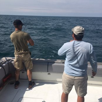 Fish Napper Charters - Hooked a big salmon. - Fishing Near Me - Saint Joseph, Michigan