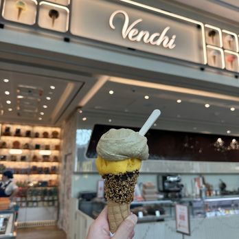 Venchi - Pistachio (top) & Mango (bottom) w/ hazelnut dark spread & nougatine on cone - Gelato Near Me - Santa Clara, California Venchi - Pistachio (top) & Mango (bottom) w/ hazelnut dark spread & nougatine on cone - Gelato Near Me - Santa Clara, California