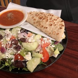 The other site of the plate of the vegetarian Gyro with tomato soup The other site of the plate of the vegetarian Gyro with tomato soup