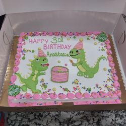 ACME Markets - Marble cake with whipped cream icing. Asked for dinosaur theme and gave pink, green and yellow as the colors. Expectations FAR exceeded!