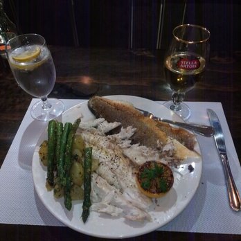 Sunnyside Cafe - Fried Branzino with baked asparagus and braised potatoes. Branzino is pretty much a Mediterranean sea bass. - Breakfast & Brunch Near Me - Sarasota, Florida Sunnyside Cafe - Fried Branzino with baked asparagus and braised potatoes. Branzino is pretty much a Mediterranean sea bass. - Breakfast & Brunch Near Me - Sarasota, Florida