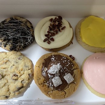 Crumbl - Mentor - Top left: cookies and cream, carrot cake and Lemon bar Bottom left: chocolate chip, peanut butter ft. Muddy buddies and classic pink sugar - Bakeries Near Me - Mentor, Ohio Crumbl - Mentor - Top left: cookies and cream, carrot cake and Lemon bar Bottom left: chocolate chip, peanut butter ft. Muddy buddies and classic pink sugar - Bakeries Near Me - Mentor, Ohio