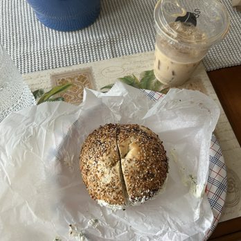 Uncommon Grounds - Everything bagel, toasted with scallion cream cheese, iced vanilla latte - Coffee & Tea Near Me - Clifton Park, New York