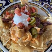 Photo of Rosa's Cafe & Tortilla Factory - Temecula, CA, United States. Fajita nachos with steak.
