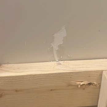 Mo_man - a hole in the wall of a bathroom - General Contractors Near Me