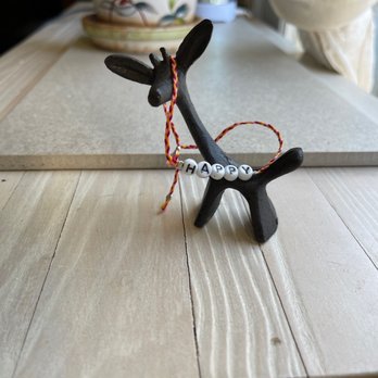 Lucky Penny General Store - Giraffe bottle opener & happy bracelet. - Women's Clothing Near Me - Santa Monica, California Lucky Penny General Store - Giraffe bottle opener & happy bracelet. - Women's Clothing Near Me - Santa Monica, California