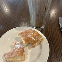 Half of a glazed donut Half of a glazed donut
