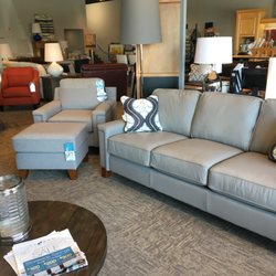 La-Z-Boy Furniture Galleries - Hazel sofa in top grain grey leather with chair and ottoman in iMerino flannel. One of our favourites.