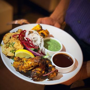 Chimney Indian Kitchen + Bar - Sampler Tandoori Jeera Wings Tandoori Chicken Murg Mailai Kabab - Indian Near Me - Chapel Hill, North Carolina Chimney Indian Kitchen + Bar - Sampler Tandoori Jeera Wings Tandoori Chicken Murg Mailai Kabab - Indian Near Me - Chapel Hill, North Carolina