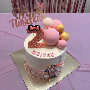 Even Dough - Minnie Mouse cake with 4 layers of vanilla cake with a strawberry swiss meringue buttercream. - Bakeries Near Me - Carrboro, North Carolina Even Dough - Minnie Mouse cake with 4 layers of vanilla cake with a strawberry swiss meringue buttercream. - Bakeries Near Me - Carrboro, North Carolina