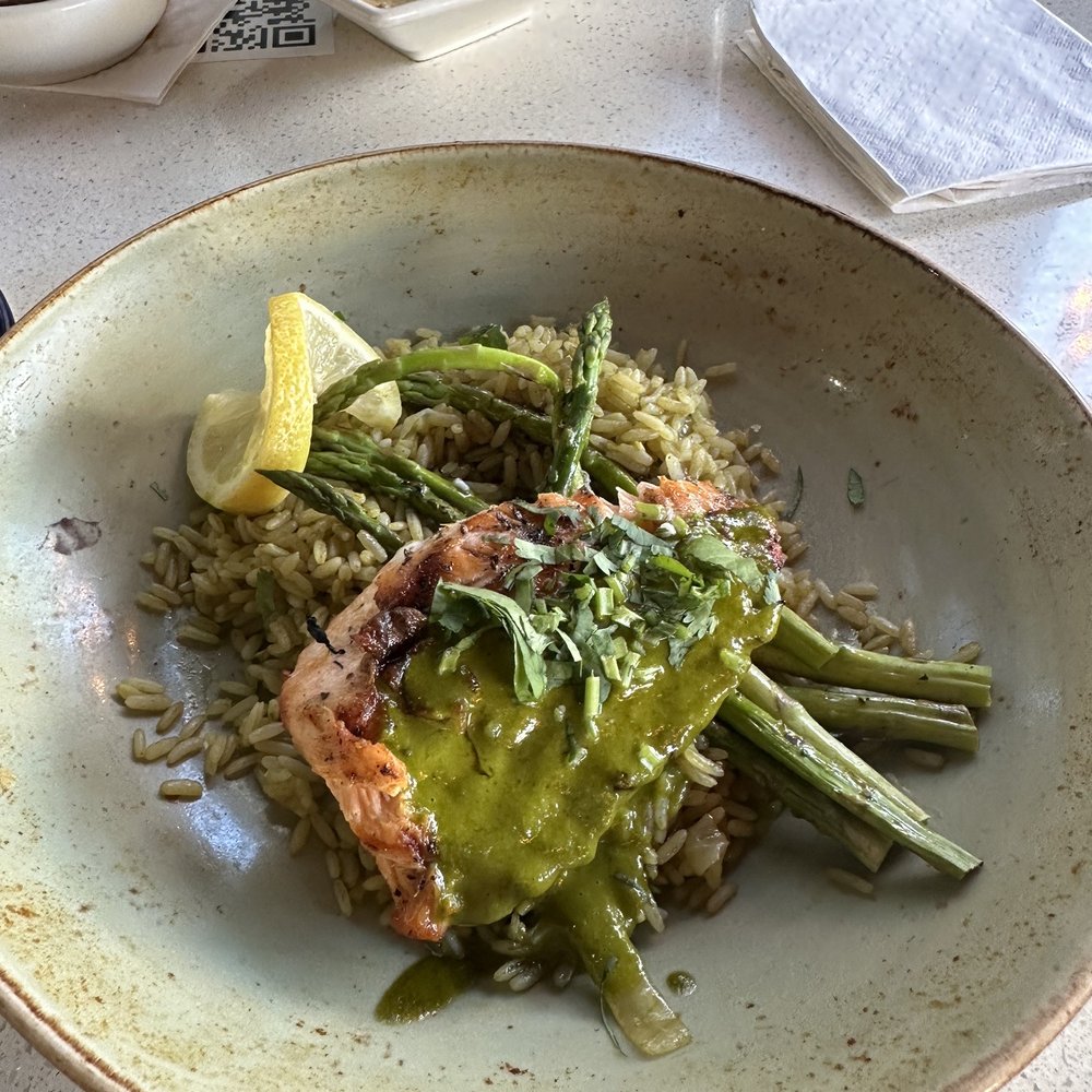 Cantina Laredo - Salmon with the green stuff - try taking the asparagus spears and dredging them though the queso - oh yeah, it was that good - Mexican Near Me - Jacksonville, Florida Cantina Laredo - Salmon with the green stuff - try taking the asparagus spears and dredging them though the queso - oh yeah, it was that good - Mexican Near Me - Jacksonville, Florida