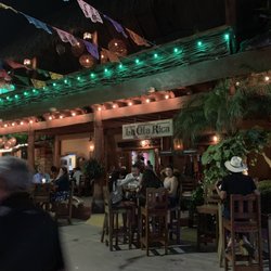 La Ola Rica - Tables adjacent to slow street. Live music across.