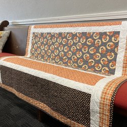 A Taste Of Andy's - One of Nancy's quilts that make this place feel like home.