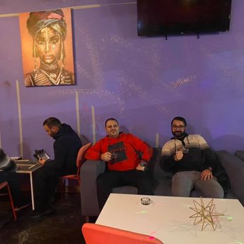 Golds Hookah Bar - three men sitting on couches - Hookah Bars Near Me - Roselle, Illinois