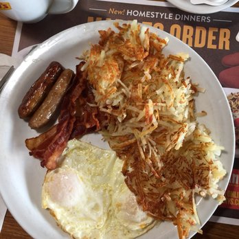 Denny's - 2 eggs over easy, 2 sausage links, 2 piece of bacon, 2 pancakes  & crispy hash browns for $5.99.  We have a WINNA - Diners Near Me - Norridge, Illinois