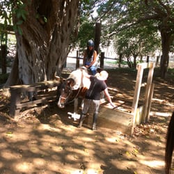 Koko Crater Equestrian Center - Getting on the horse