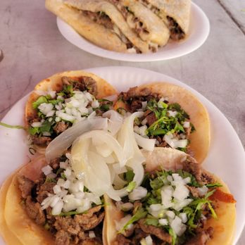 Tacos Gutierrez - Asada quesodilla and Asada Tacos with onions and cilantro. - Tacos Near Me - Santa Ana, California Tacos Gutierrez - Asada quesodilla and Asada Tacos with onions and cilantro. - Tacos Near Me - Santa Ana, California