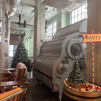 Sunshine Mill Winery - More fun groupings of comfy couches plus tie decor and historical equipment. - Venues & Event Spaces Near Me - The Dalles, Oregon