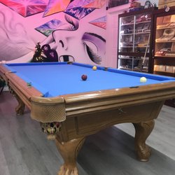 The Spot Smoke Shop and Kava Bar - World-class pool table & mural art!