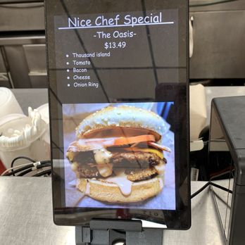 Nice Burger - Cher's Special Sign showing Oasis burger - Vegan Near Me - Stanton, California Nice Burger - Cher's Special Sign showing Oasis burger - Vegan Near Me - Stanton, California