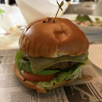 Toulouse Cafe and Bar - Toulouse Burger 8oz house ground steak burger, bacon, avocado, lettuce, tomato, gruyère, brioche bread, pommes frites - French Near Me - Houston, Texas Toulouse Cafe and Bar - Toulouse Burger 8oz house ground steak burger, bacon, avocado, lettuce, tomato, gruyère, brioche bread, pommes frites - French Near Me - Houston, Texas