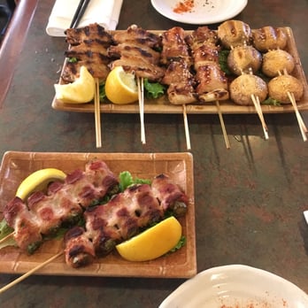 Kirala - from the robata grill: asparagus wrapped bacon, chicken wings, chicken w/ green onion, and mushrooms - Sushi Bars Near Me - Berkeley, California