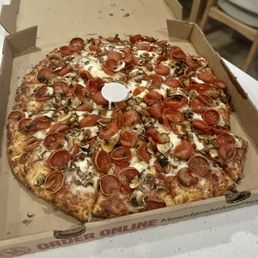 Pepperoni and mushroom pizza
