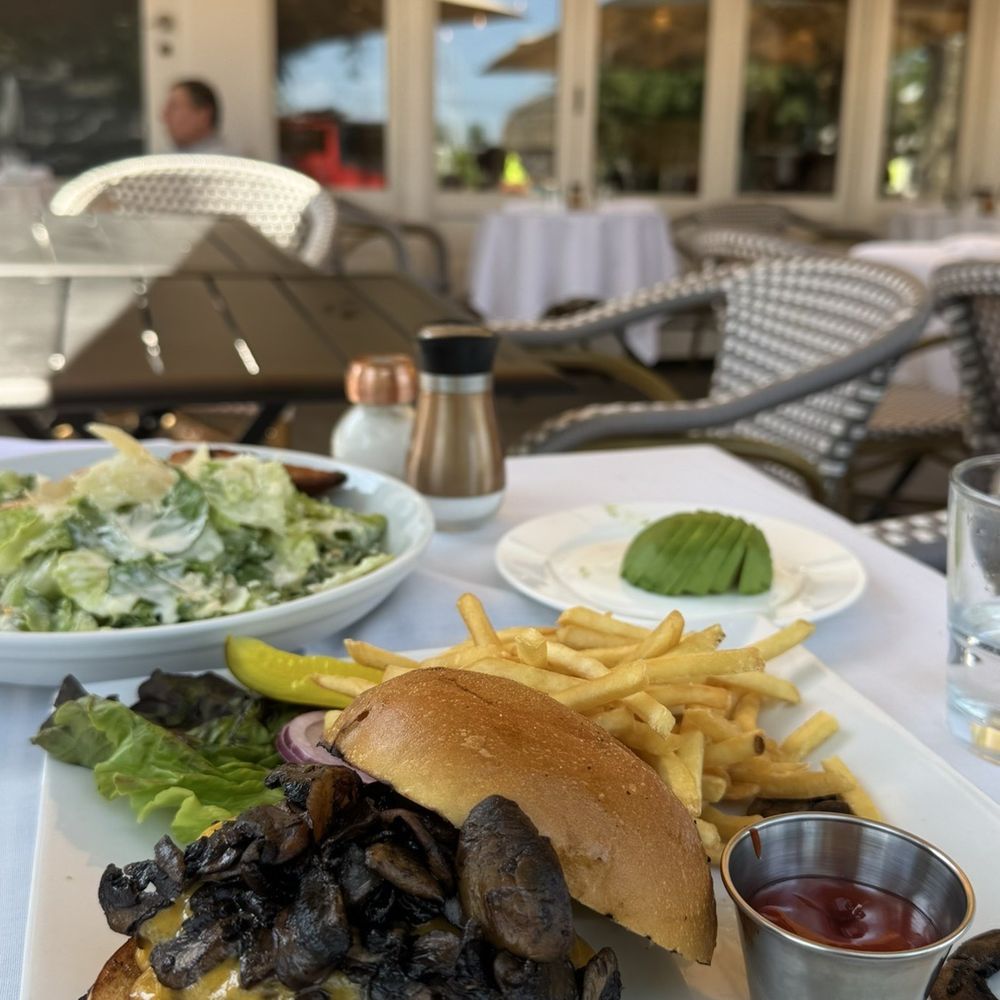 75 Main - 75 Main Prime Burger ($25+) with sautéed mushrooms ($3+), cheese ($3+) and avocado ($8+) on the side - New American Near Me - Southampton, New York
