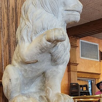 Red Rose - a statue of a lion on a shelf - Pizza Near Me - Springfield, Massachusetts