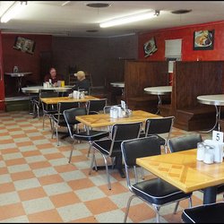 Fuegos Restaurant - As you enter the restaurant, you'll note the dining room is quite plain, but it's clean, comfortable, and the atmosphere is very friendly