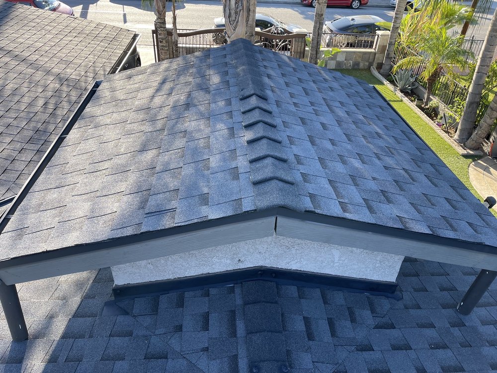 Slide of DT Roofing