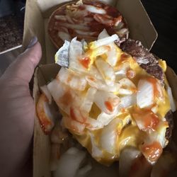 McDonald's - Quarter Pounder with Cheese with an ABSURD amount of onions.