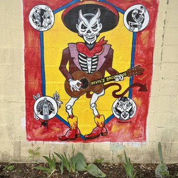 Devil's Backbone Tavern - Great art on building - Dive Bars Near Me - Fischer, Texas