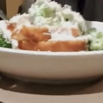 Olive Garden Italian Restaurant - Chicken fritter on top of Alfredo and broccoli and a load of shredded cheese - Italian Near Me - Affton, Missouri