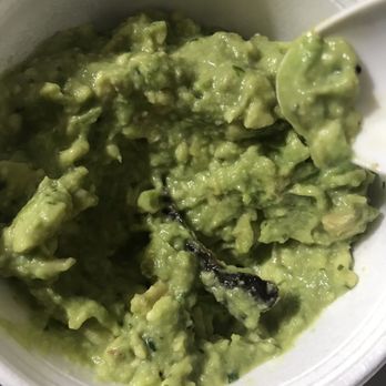 Los Girasoles - Guac. No tomato, onion, cilantro. Also, that black thing is the piece of avocado peel. - Mexican Near Me - Youngstown, Ohio Los Girasoles - Guac. No tomato, onion, cilantro. Also, that black thing is the piece of avocado peel. - Mexican Near Me - Youngstown, Ohio