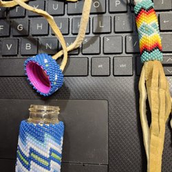 Sage Hill Travel Center - Beaded pill bottle with smoke tan buckskin carrier. Double nylon beaded keychain with smoke tan buckskin fringe. Blessing you and artist.