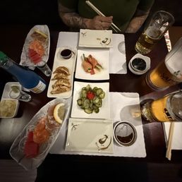 Gyoza. Cucumber salad. Beer. Happy sushi plate. Tu-Sal Gyoza. Cucumber salad. Beer. Happy sushi plate. Tu-Sal