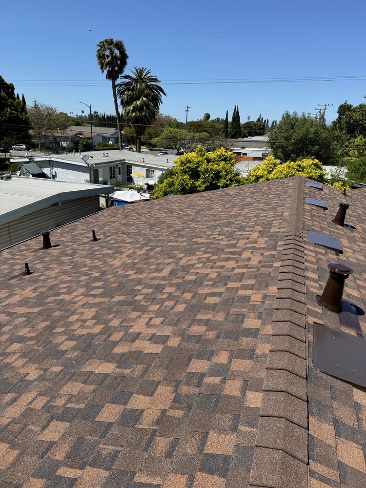 Slide of G West Roofing