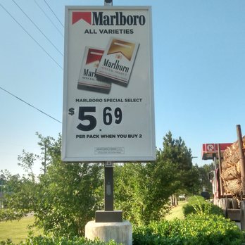 Corner Store - a sign for marlboro and marlboro - Convenience Stores Near Me - Conroe, Texas