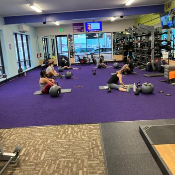 Anytime Fitness - Coach Chris. Taking members through stretching exercises. - Gyms Near Me - Honolulu, Hawaii Anytime Fitness - Coach Chris. Taking members through stretching exercises. - Gyms Near Me - Honolulu, Hawaii
