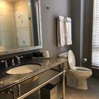 Hotel Blackhawk, Autograph Collection - Large vanity with a TV in the mirror - Hotels Near Me - Davenport, Iowa Hotel Blackhawk, Autograph Collection - Large vanity with a TV in the mirror - Hotels Near Me - Davenport, Iowa
