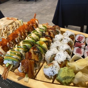 HIRO Sushi - a variety of sushi on a wooden platter - Japanese Near Me - Medford, Oregon HIRO Sushi - a variety of sushi on a wooden platter - Japanese Near Me - Medford, Oregon