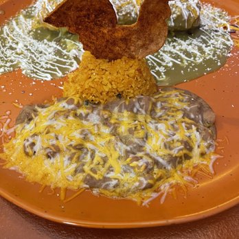 Mi Casa Restaurant - Pork chimichanga, rice & beans and of course, the rooster! - Mexican Near Me - Benson, Arizona Mi Casa Restaurant - Pork chimichanga, rice & beans and of course, the rooster! - Mexican Near Me - Benson, Arizona