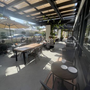 Brass Bird Coffee - Patio area. Shady and nicely spaced. - Coffee & Tea Near Me - Carpinteria, California Brass Bird Coffee - Patio area. Shady and nicely spaced. - Coffee & Tea Near Me - Carpinteria, California