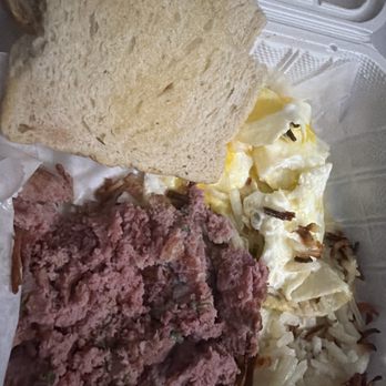 Moke’s Bread And Breakfast - Corned beef hash patty with eggs and hashbrowns. - Breakfast & Brunch Near Me - Honolulu, Hawaii